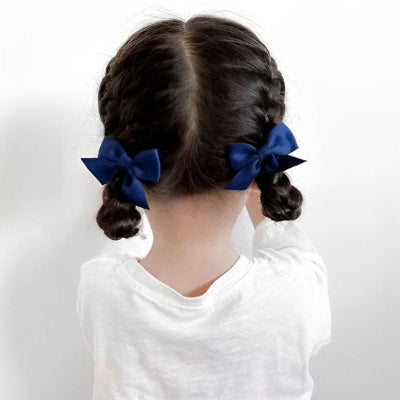 Barrette à cheveux bleue qui booste la confiance des enfants