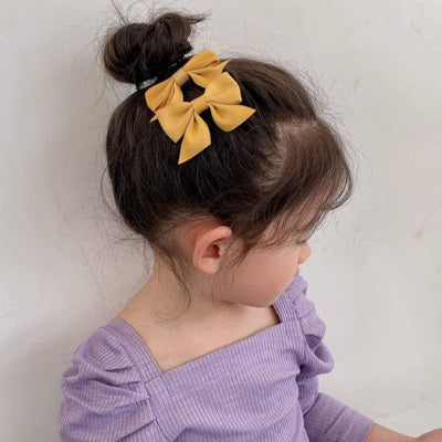Barrette à cheveux jaune pratique pour coiffures rapides