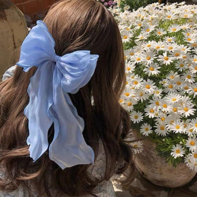 Barrette cheveux élégante avec nœud satiné romantique