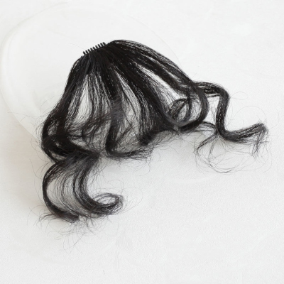 Frange bouclé teinte naturelle noire