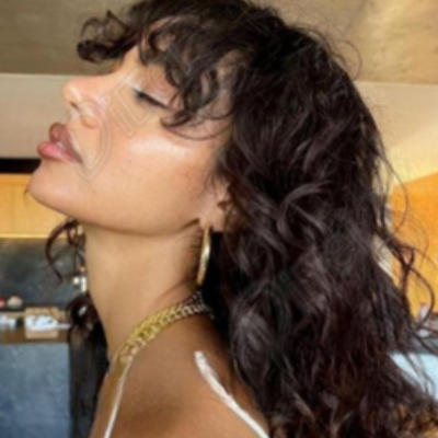 Frange cheveux bouclés long effet glamour