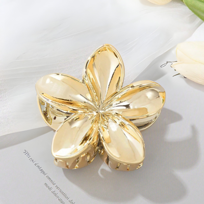 Pince à cheveux fleur dorée brillante