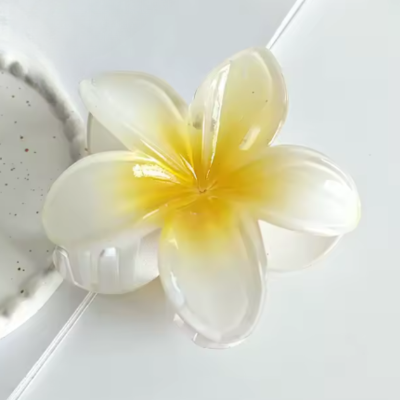 Pince fleur hawaïenne jaune soleil look tropical