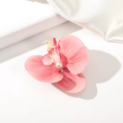 Pince hawaienne orchidée blanche accessoire mariage invitée