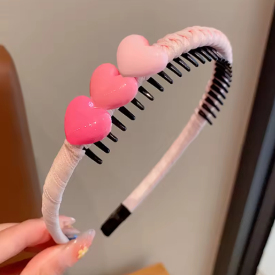 Serre tete enfant à cœur rose Nova Coiffure