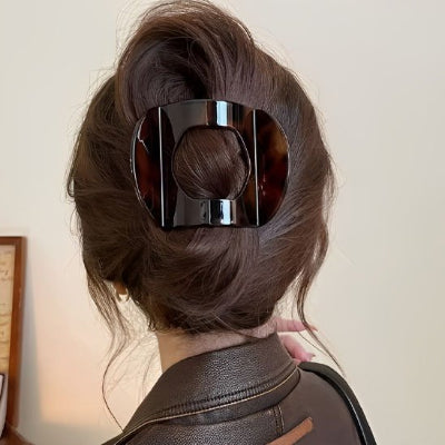 Pince à cheveux noir en acide acétique